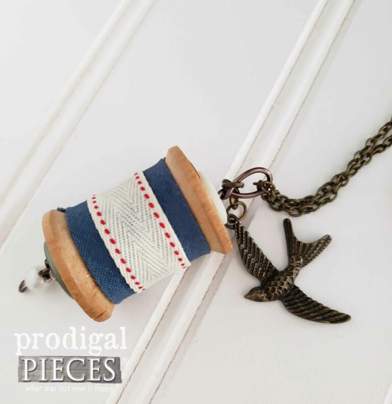 Vintage Wooden Spool Necklace with Brass Bird Charm | shop.prodigalpieces.com