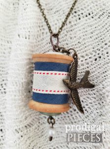 Brass Bird Charm on Handmade Vintage Wooden Spool Necklace by Prodigal Pieces | shop.prodiaglpieces.com