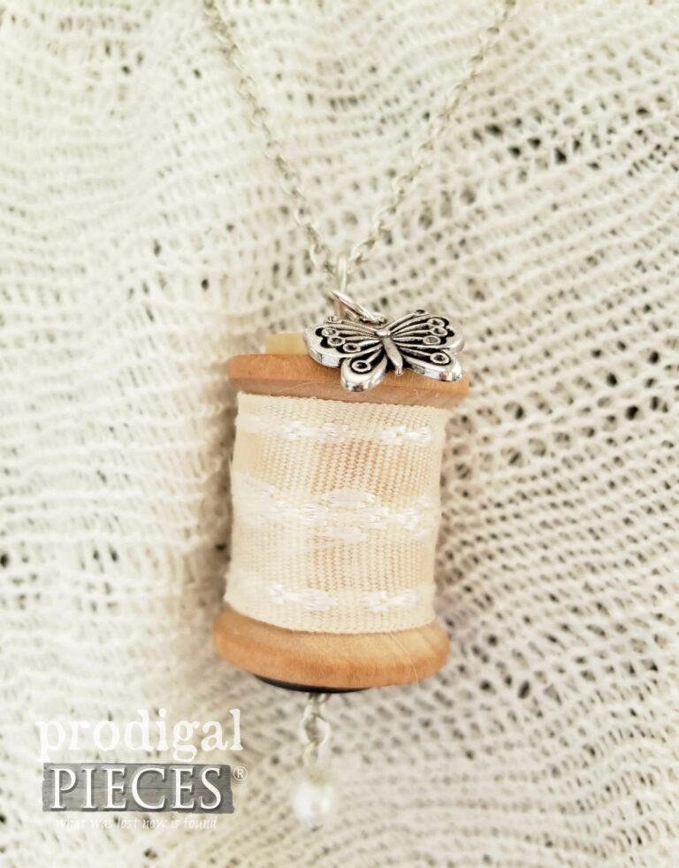 Butterfly Charm on Wooden Spool Necklace at shop.prodigalpieces.com