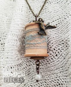 Brass Hummingbird Charm on Wooden Spool Necklace | shop.prodigalpieces.com