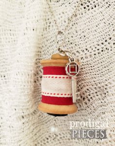 Red Ribbon with Silver Key Charm on Wooden Spool Necklace | shop.prodigalpieces.com