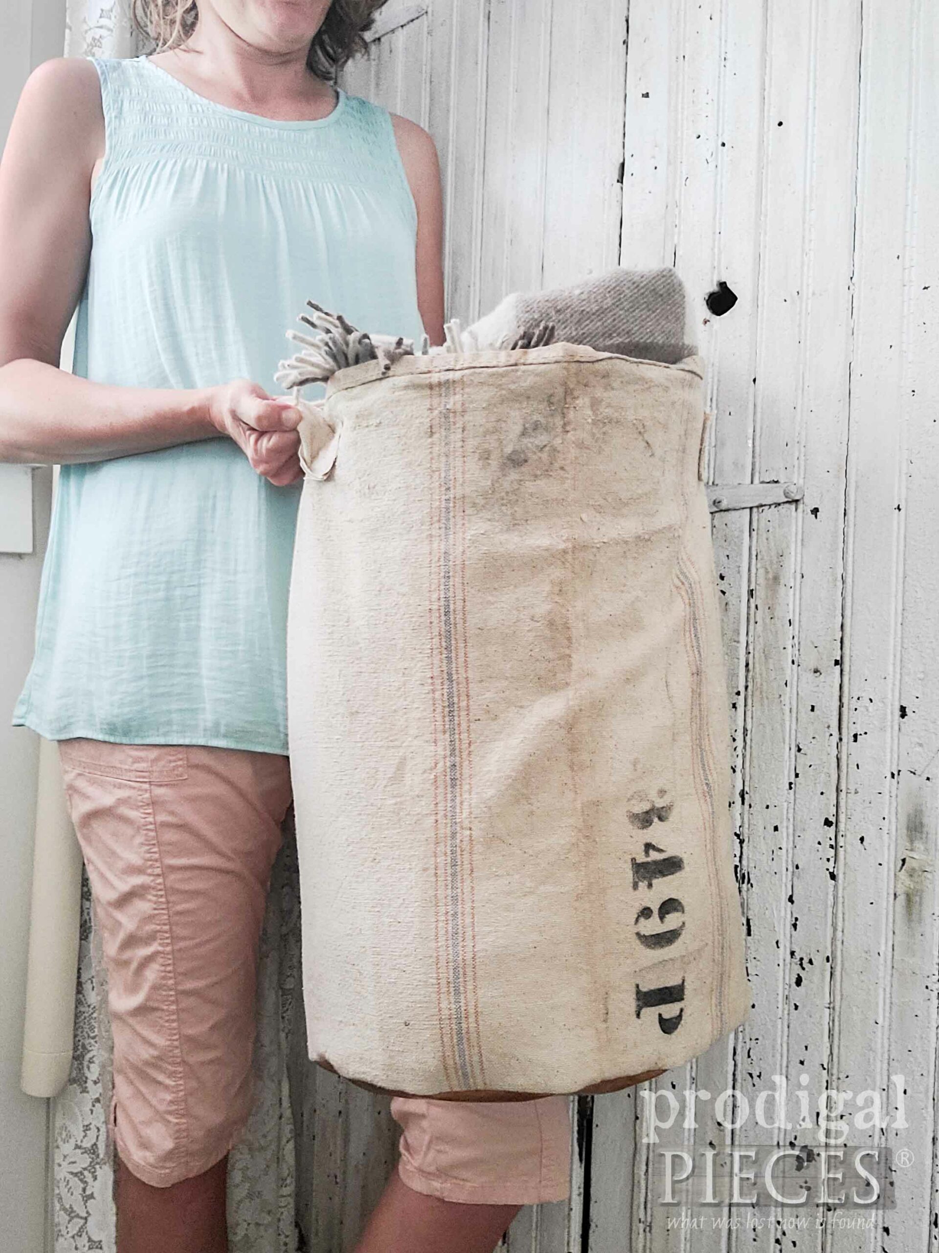 Larissa of Prodigal Pieces with Antique Feed Sack Bucket | shop.prodigalpieces.com #prodigalpieces